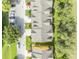 High angle aerial of a townhome complex and parking area, showing the roofs at 1534 Barking Deer Cv, Casselberry, FL 32707