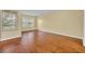 Bedroom featuring hardwood floors, a double-hung window, and neutral paint at 1534 Barking Deer Cv, Casselberry, FL 32707