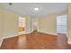 Spacious bedroom with hardwood floors and access to both the bathroom and walk-in closet at 1534 Barking Deer Cv, Casselberry, FL 32707