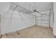 Spacious two-car garage with ample storage and a functional layout for vehicle parking and organization at 1534 Barking Deer Cv, Casselberry, FL 32707