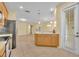 Open-concept kitchen and living room with breakfast bar at 1534 Barking Deer Cv, Casselberry, FL 32707