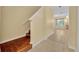 The light-filled staircase leads to the second level of the house, and to the living area at 1534 Barking Deer Cv, Casselberry, FL 32707