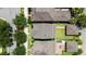 Aerial view of home featuring a backyard, lush lawn, and nearby mature trees at 15448 Murcott Blossom Blvd, Winter Garden, FL 34787