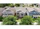 Aerial shot of home showcasing its manicured landscaping and neighborly surroundings at 15448 Murcott Blossom Blvd, Winter Garden, FL 34787