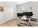 Bright home office with multi-monitor setup, natural light, and a comfortable workspace at 15448 Murcott Blossom Blvd, Winter Garden, FL 34787