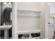 Convenient entryway featuring storage and a sink at 16412 Good Hearth Blvd, Clermont, FL 34711