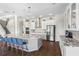Bright kitchen with a large center island, stainless appliances and a breakfast bar at 16412 Good Hearth Blvd, Clermont, FL 34711