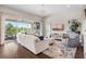 Comfortable living room with access to an outdoor patio with scenic views at 16412 Good Hearth Blvd, Clermont, FL 34711