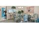 Comfortable dining area with seating for four and view of kitchen at 165 Durham Pl # 165, Longwood, FL 32779