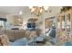 Open floor plan featuring dining room, living room with fireplace, and a bar area at 165 Durham Pl # 165, Longwood, FL 32779