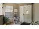 Inviting entryway with a white front door, sidelight, and decorative floral arrangements at 165 Durham Pl # 165, Longwood, FL 32779