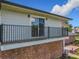 View of the balcony with black railings at 1850 Lakeshore Cir, Longwood, FL 32750