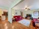 Bright living room featuring hardwood floors, recessed lighting, and a ceiling fan at 1850 Lakeshore Cir, Longwood, FL 32750