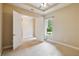 Bedroom showcasing a ceiling fan, neutral colors, and carpet flooring at 207 Spalding Way, Deland, FL 32724