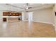 Spacious living area with tile flooring, recessed lighting, an island kitchen, and a seamless flow at 207 Spalding Way, Deland, FL 32724