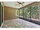 Screened patio with stone flooring and wooded views, ideal for relaxing at 207 Spalding Way, Deland, FL 32724