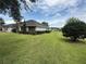 Charming single-story home with well-manicured lawn and tasteful landscaping enhancing curb appeal at 23717 Milford Dr, Eustis, FL 32736