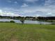 Scenic lake view from the backyard at 23717 Milford Dr, Eustis, FL 32736