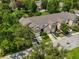 An aerial view of multi-Gathering residences featuring well-kept landscaping and private garages at 2420 Stockton Dr, Sanford, FL 32771