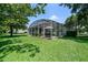 Enclosed patio with well manicured yard in a quiet setting at 2426 Breezy Meadow Rd, Apopka, FL 32712