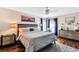 Serene main bedroom with a comfortable bed, soft lighting, and elegant decor for a restful retreat at 2919 Foraker Way, Kissimmee, FL 34758