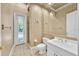 Bathroom with a shower, white cabinets, a large mirror, and tile flooring at 307 Running Wind Ln, Maitland, FL 32751