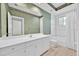 Bathroom featuring an extended vanity and a shower/tub combo with a window at 307 Running Wind Ln, Maitland, FL 32751