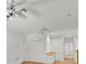 Neutral bedroom with carpet, chair rail, and two ceiling fans at 307 Running Wind Ln, Maitland, FL 32751