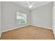 Bedroom with carpet, a window with blinds, and a ceiling fan at 307 Running Wind Ln, Maitland, FL 32751