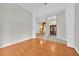 Elegant foyer showcasing hardwood floors, chandeliers, and decorative molding at 307 Running Wind Ln, Maitland, FL 32751