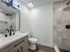 Updated bathroom featuring a modern vanity and tiled walk-in shower at 3321 Mahalia Pl, Orlando, FL 32805