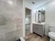Bathroom featuring modern vanity and tiled shower at 3321 Mahalia Pl, Orlando, FL 32805