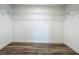 Walk-in closet with wooden floor and wire shelving at 3321 Mahalia Pl, Orlando, FL 32805