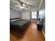Cozy bedroom with a ceiling fan and window that brings in natural light at 34 W Bob White St, Apopka, FL 32712