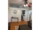 Comfortable living room with wood floors and an open layout into the kitchen area at 34 W Bob White St, Apopka, FL 32712