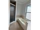Bathroom featuring bath tub and glass-enclosed shower at 3917 Lake Mira Dr, Orlando, FL 32817