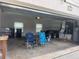 Organized two car garage with two beach chairs at 3917 Lake Mira Dr, Orlando, FL 32817