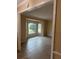 Bright living room featuring a bay window offering ample natural light and views of the outdoors at 3917 Lake Mira Dr, Orlando, FL 32817
