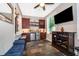 Entertainment area with a wet bar, wine storage, a mounted television, and tile flooring at 394 Baymoor Way, Lake Mary, FL 32746