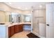 Bathroom with modern shower and glass door, a double vanity with a large mirror, and tiled floors at 394 Baymoor Way, Lake Mary, FL 32746