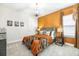 Cozy bedroom with a plush bed, decorative pillows, and ample natural light at 421 Southfield St, Kissimmee, FL 34747
