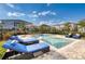 Relaxing backyard oasis with a private pool, lounge chairs, and lush landscaping at 421 Southfield St, Kissimmee, FL 34747