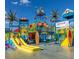 playing at the community waterpark with slides, splash zones, and interactive features, making it Gathering-friendly fun at 421 Southfield St, Kissimmee, FL 34747