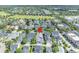 Overhead perspective of a residential area boasting mature trees, well-maintained homes, and convenient access to amenities at 4310 Ethan Lane Ln, Orlando, FL 32814
