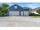 Spacious three-car garage with ample parking and storage, perfect for car enthusiasts or those needing extra space at 4310 Ethan Lane Ln, Orlando, FL 32814