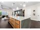 Spacious kitchen island with modern cabinets, marble countertop, and pendant lights at 4310 Ethan Lane Ln, Orlando, FL 32814