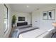 A well-lit bedroom showcasing a large window and closet at 4800 Reginald Rd, Orlando, FL 32829