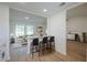 Features a breakfast bar separating the kitchen from the living space at 4800 Reginald Rd, Orlando, FL 32829