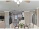 Bright and open kitchen and dining area featuring modern stainless steel appliances at 4933 Balboa Dr, Orlando, FL 32808