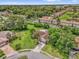 An aerial view of a home with lush landscaping at 4959 Ardmore Dr, Winter Park, FL 32792